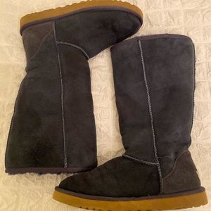 Navy tall classic UGG boots.